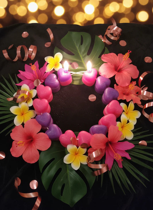 Decorative candles circular shape  with flowers on a dark background